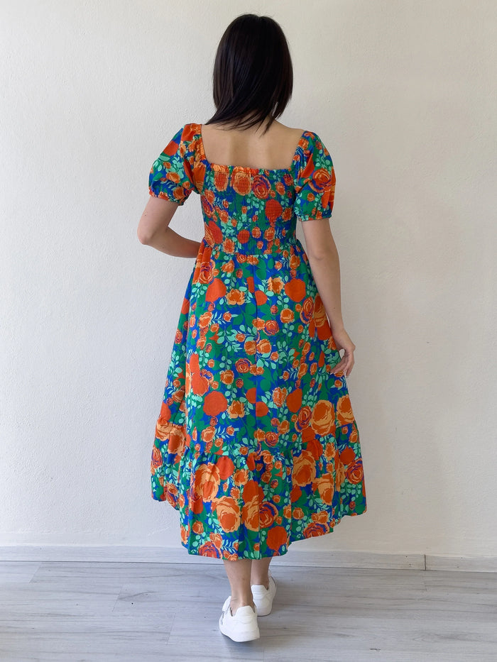 Kadın Turuncu Çiçek Desenli Göğüs Gipeli Midi Boy Yazlık Elbise