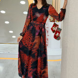 Kadın Kırmızı V yaka Kuşaklı Batik Desen Tül Midi Boy Büyük Beden Elbise