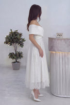 Yan duruş beyaz pul işlemeli söz nişan için midi boy abiye elbise beyaz