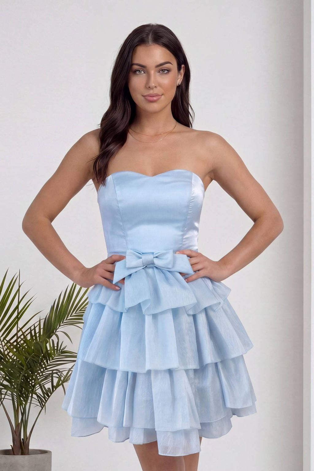 Bebe mavisi straplez elbise ön ortasında büyük fiyonk detayıyla