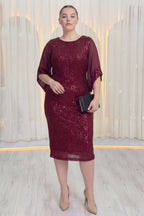 ZKS bordo pulpayetli midi elbise, büyük beden, şeffaf kollu, elde siyah çanta ile duruş