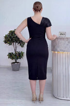 Asimetik kolsuz büyük beden siyah elbise arka 