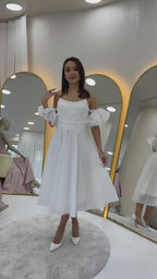  Drapeli Boyundan Bağlamalı Fiyonk Kol Detay Kısa Abiye Elbise